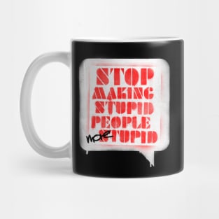 Stop making stupid people more stupid Mug